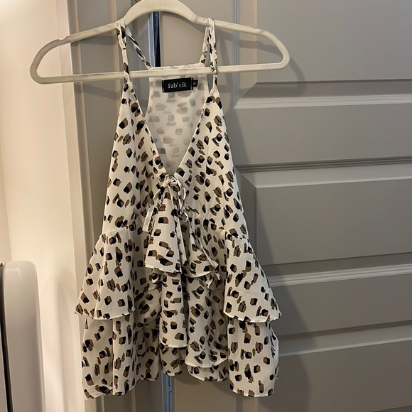 fab'rik Tops - V-neck peplum leopard tank with side zip detail
